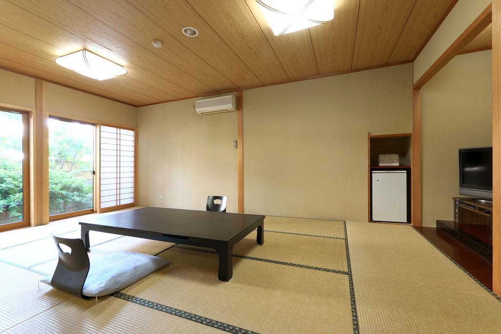 Yuraku Hotel Awara Pokoj fotografie
