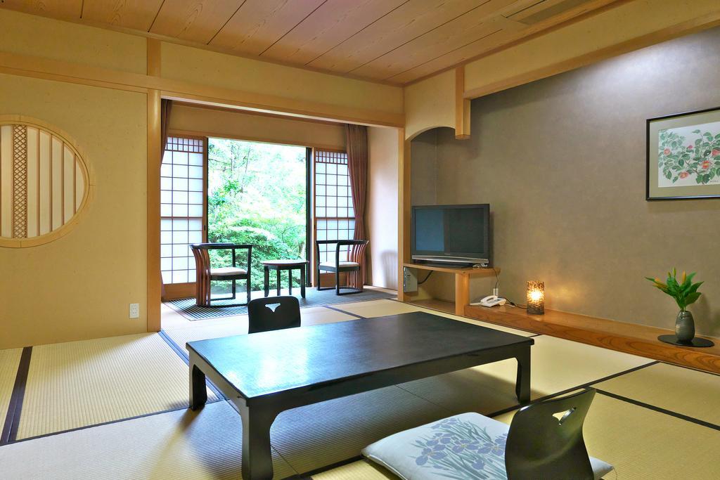 Yuraku Hotel Awara Pokoj fotografie
